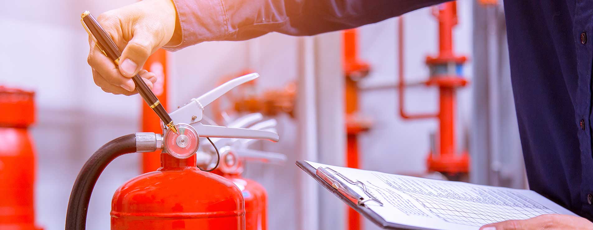 man checking fire safety